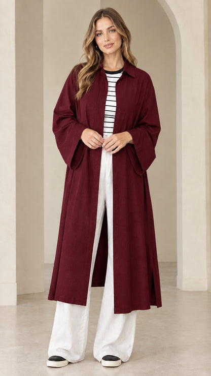 Model wearing wine red longline buttoned shirt dress coat