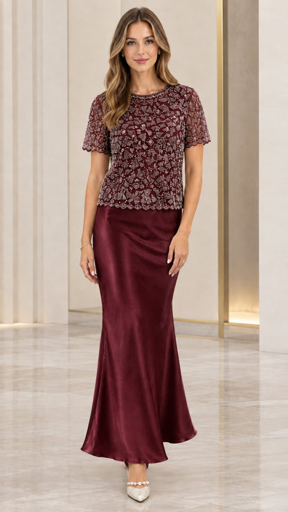 Front view of burgundy beaded lace and satin maxi evening dress