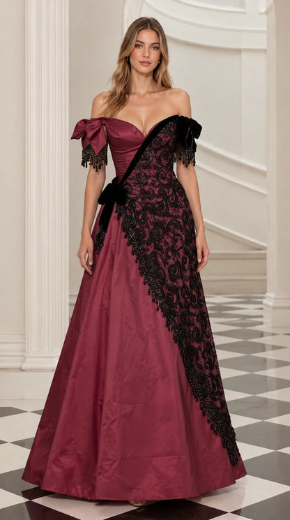 Front view of burgundy red off-the-shoulder gala gown with black lace detailing