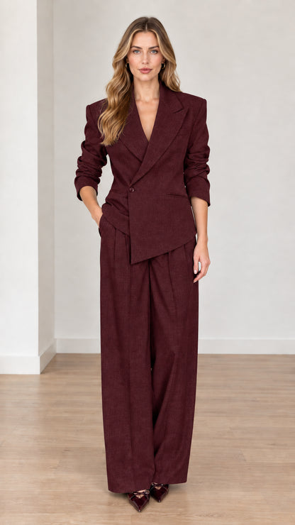 Full front view of woman wearing Burgundy wine asymmetrical pant suit set