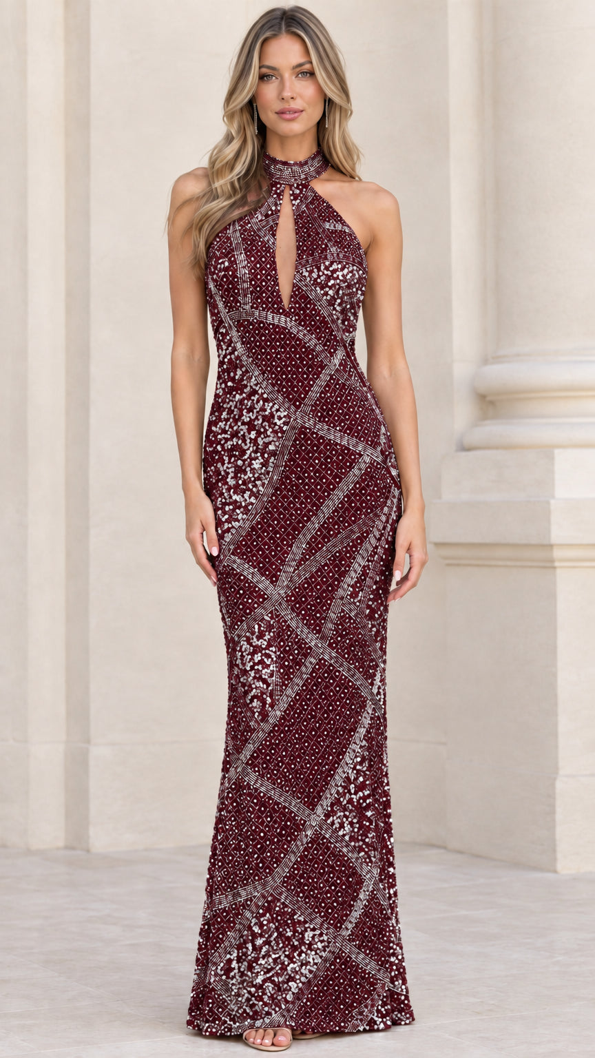 Full front view of burgundy wine geometric sequin halter evening gown on model