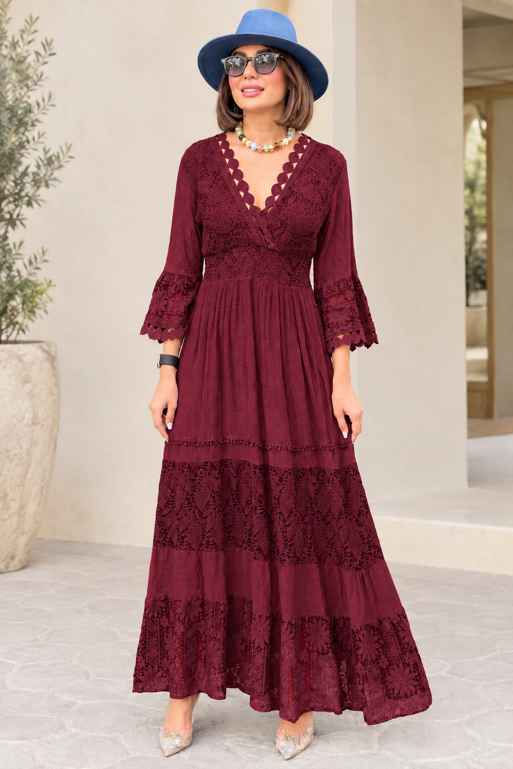 Burgundy red lace tiered maxi dress with flowy skirt and floral crochet trim