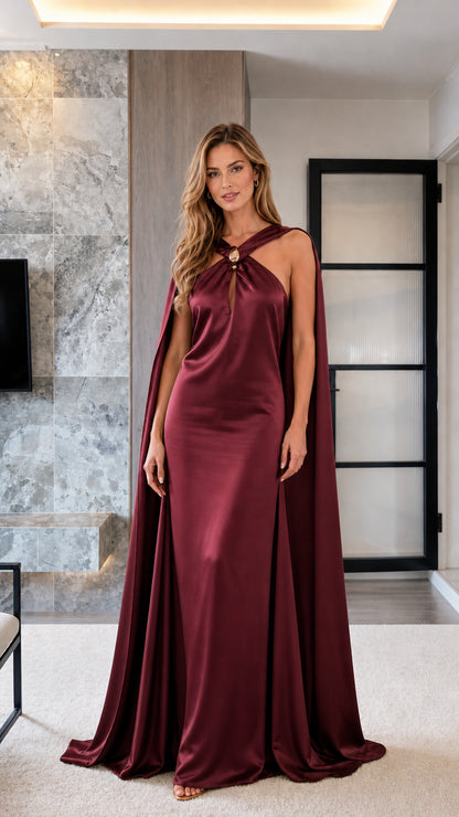 Full length view of deep burgundy wine satin cape evening gown
