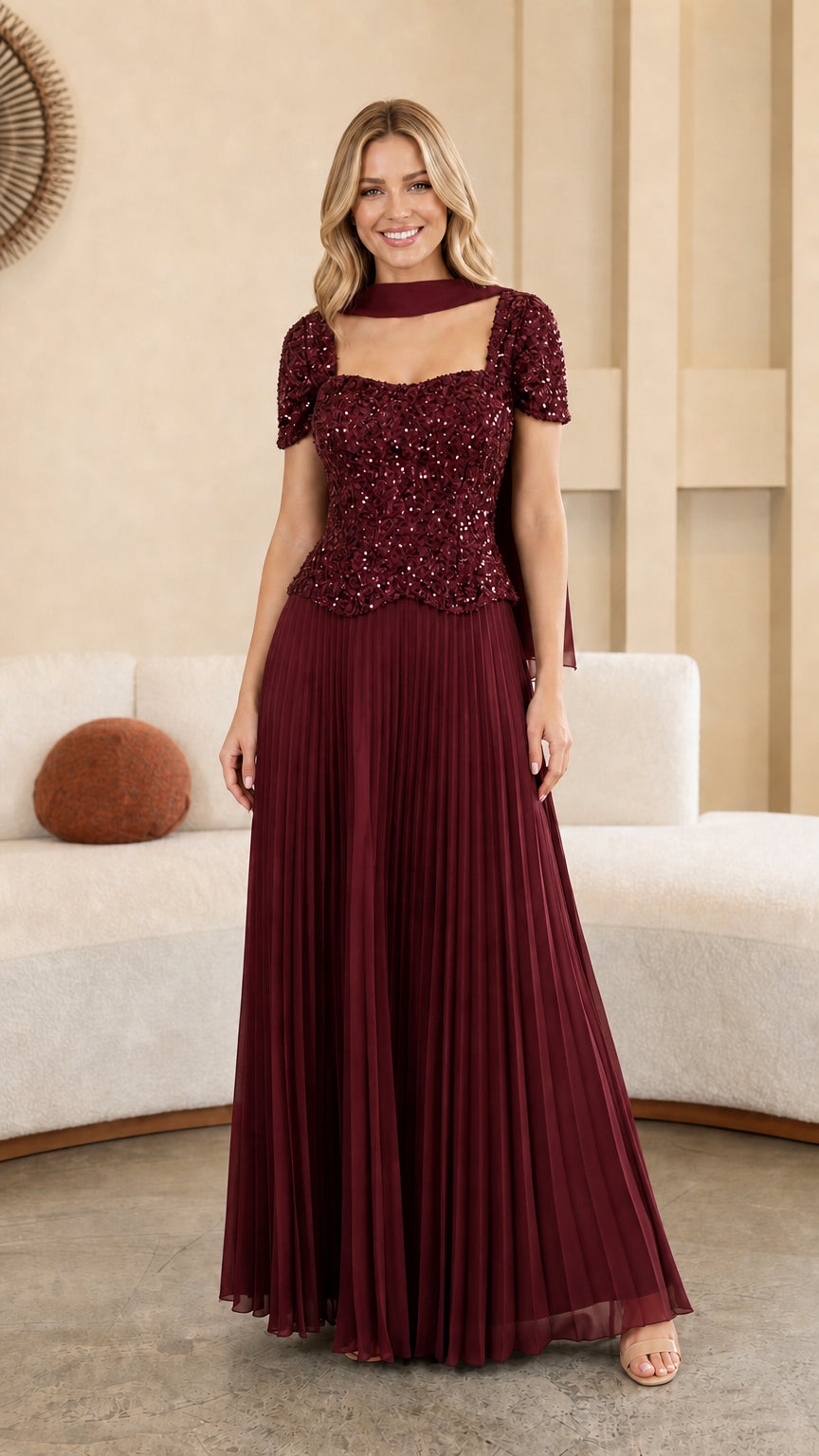 Model wearing Burgundy wine sequined bodice pleated maxi evening dress