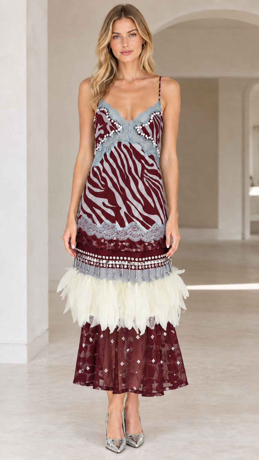 Burgundy wine zebra print cami midi dress with feather trim on model
