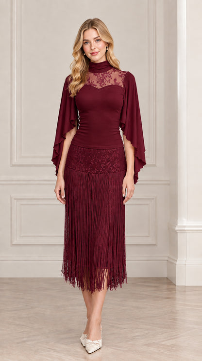 Front view of model wearing burgundy red lace cape sleeve fringe midi dress