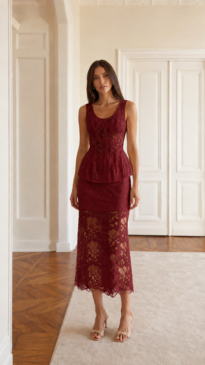Front view of burgundy sleeveless lace peplum midi dress set