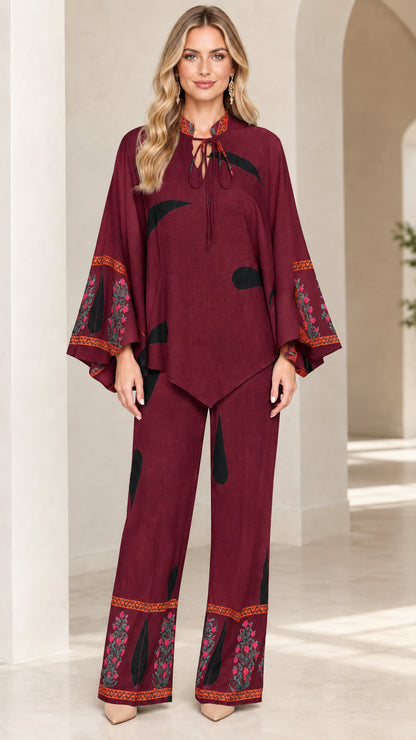 Front view of women's burgundy wine printed tunic and wide-leg pants set