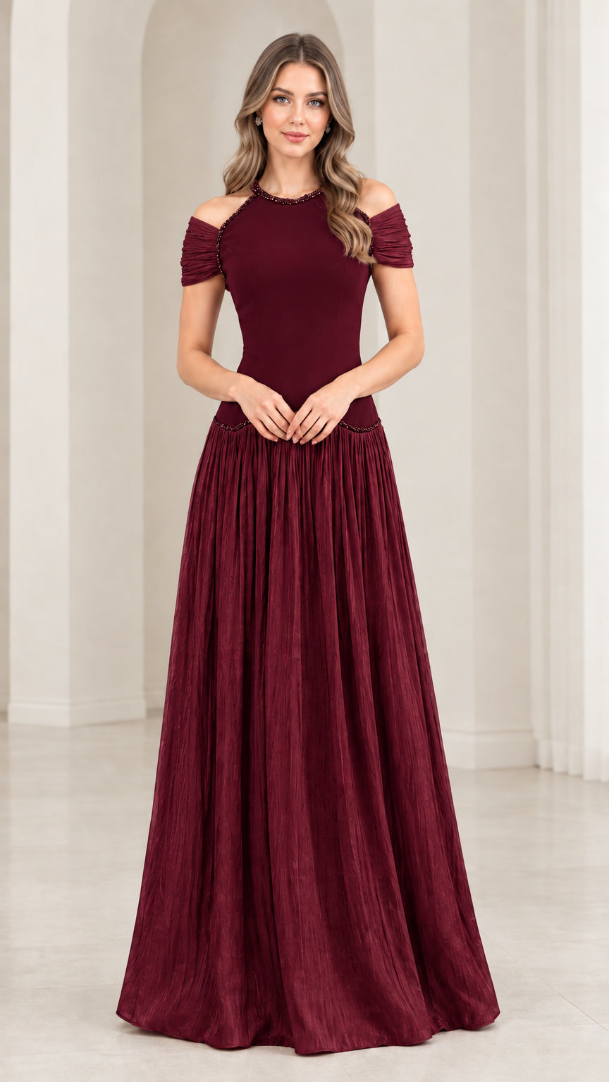 Woman wearing burgundy cold shoulder beaded pleated maxi dress