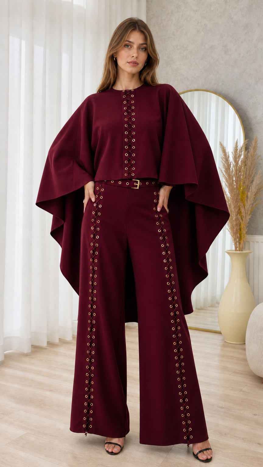 Front full-length view of burgundy wine cape sleeve top and eyelet wide-leg pant set