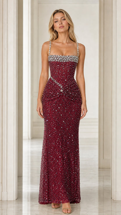 Front view of Burgundy embellished floor-length formal evening gown