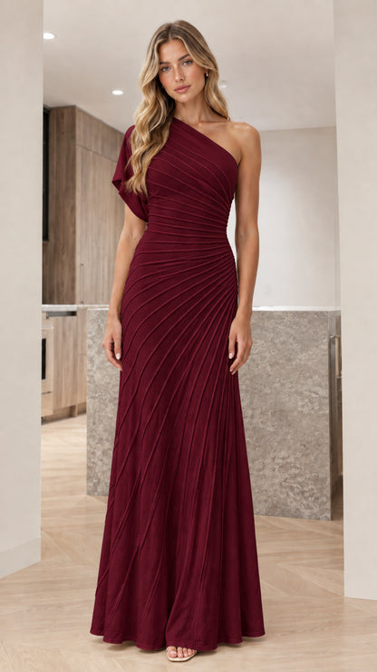 Front view of woman wearing burgundy wine one-shoulder pleated evening gown