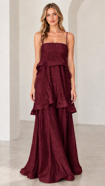 Model wearing rich burgundy wine textured tiered sleeveless maxi dress