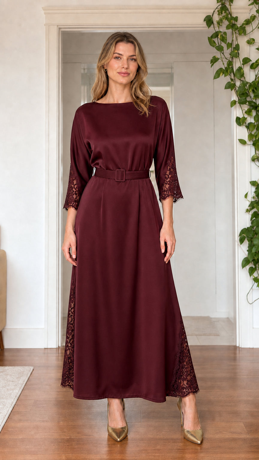 Front view of model wearing burgundy wine satin maxi dress with lace detailing