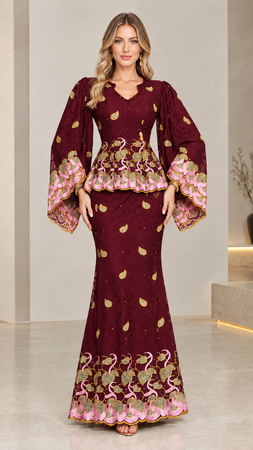 Front view of model wearing burgundy wine red embroidered peplum maxi dress set