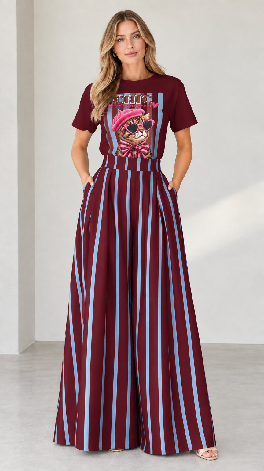 Full-length shot of burgundy graphic tee and burgundy striped wide-leg pants set