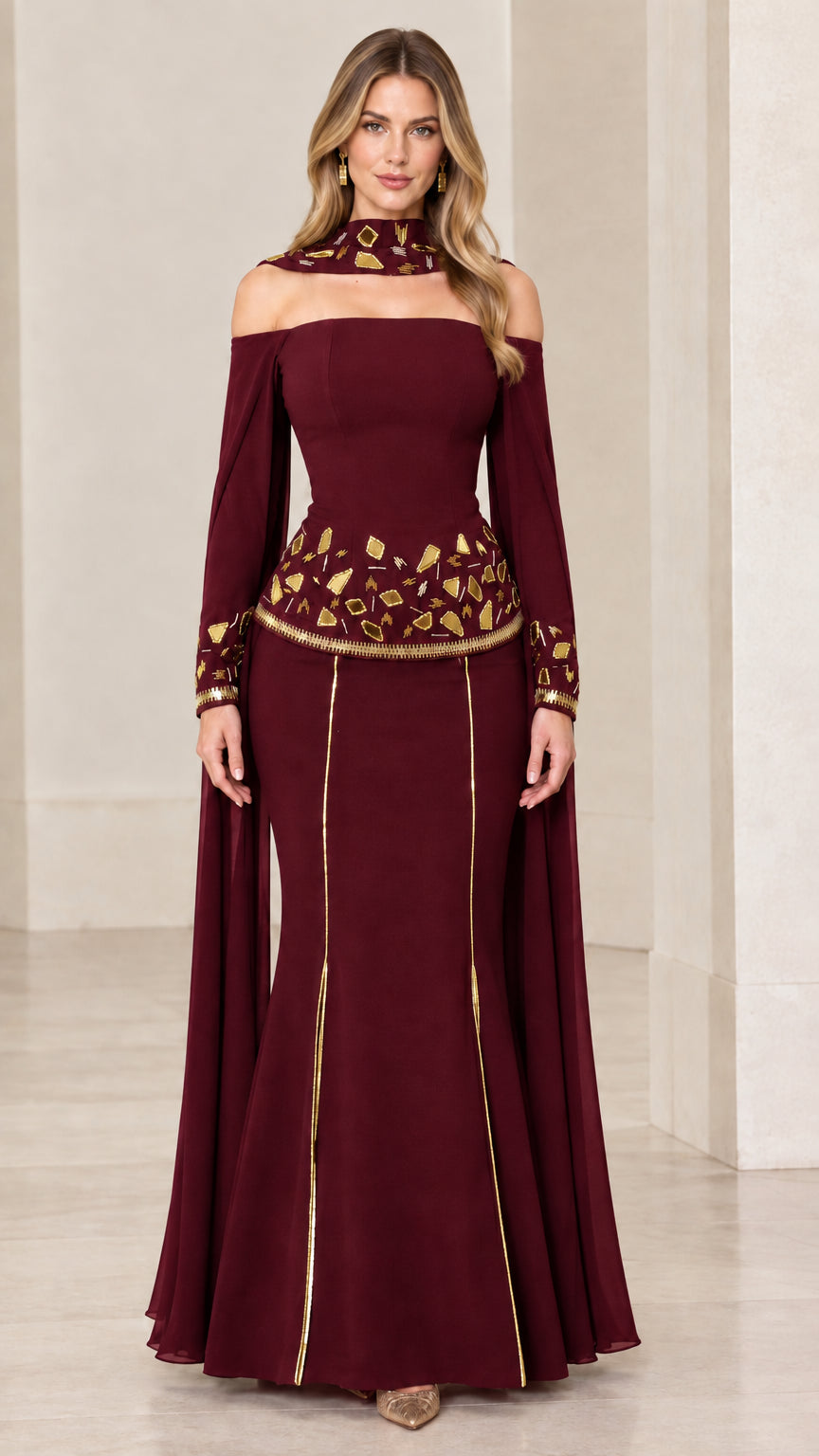 Burgundy formal evening gown with embroidered accents and cold-shoulder design