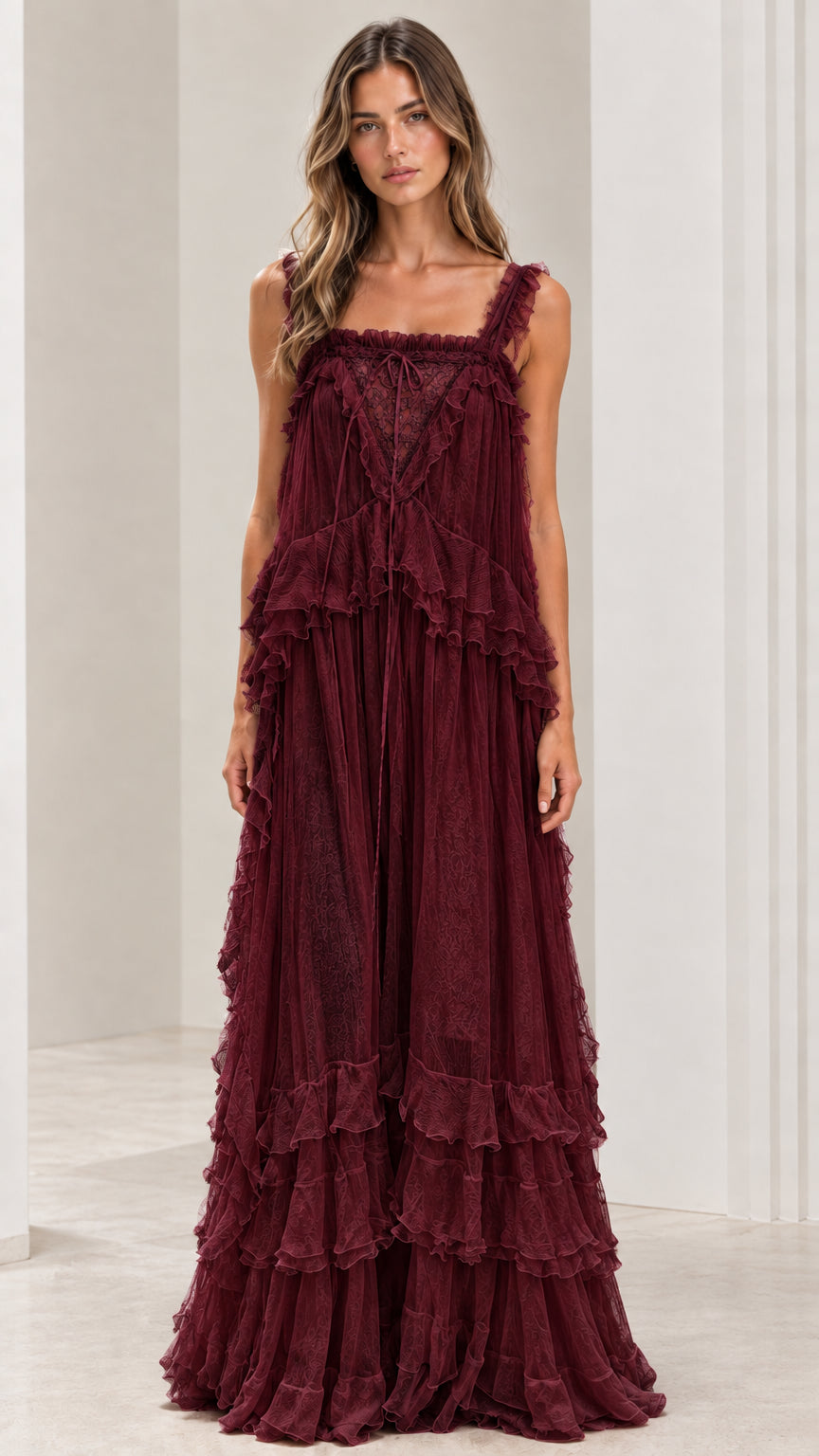 Front view of woman wearing burgundy wine tiered lace maxi dress