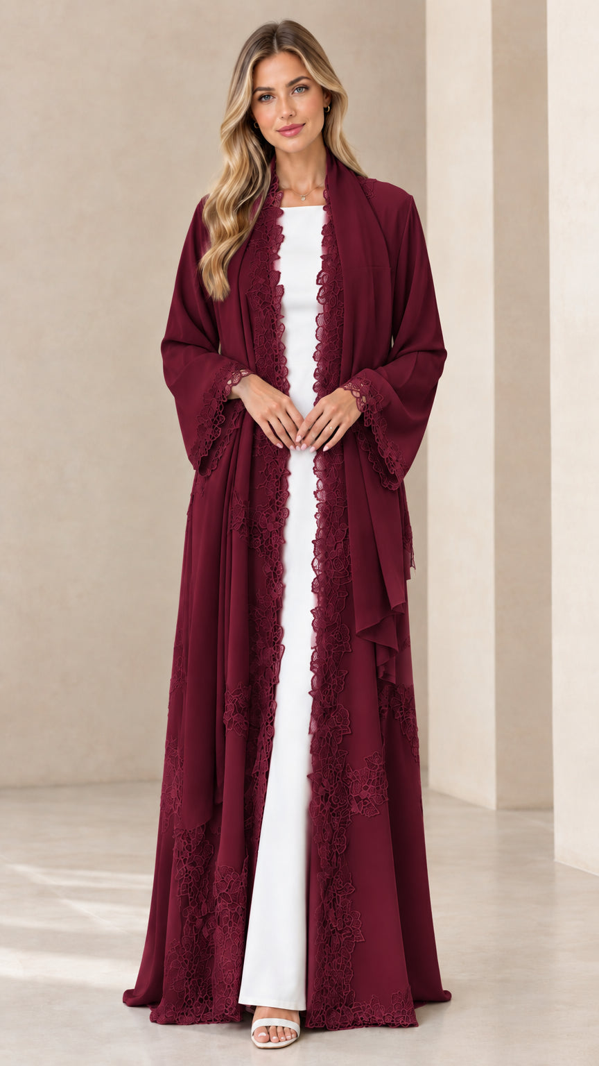 Front view of model wearing rich burgundy lace-trim maxi open front cardigan