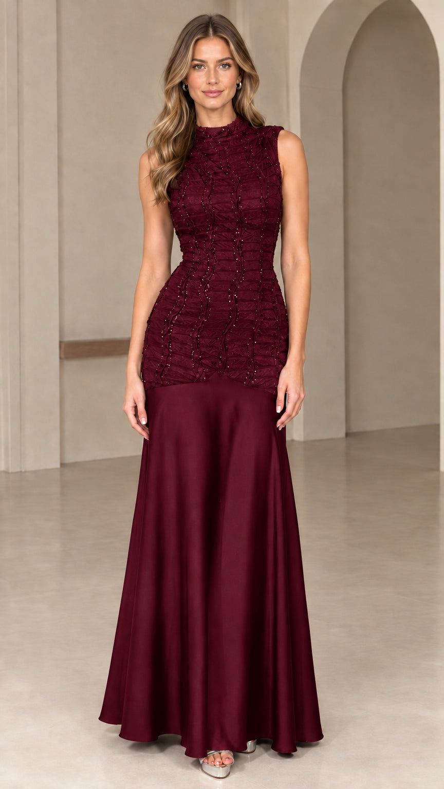 Front view of rich burgundy high neck beaded evening gown