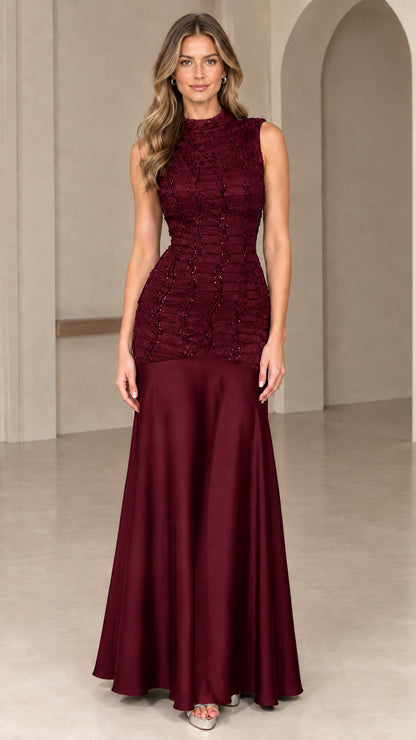 Front view of rich burgundy high neck beaded evening gown