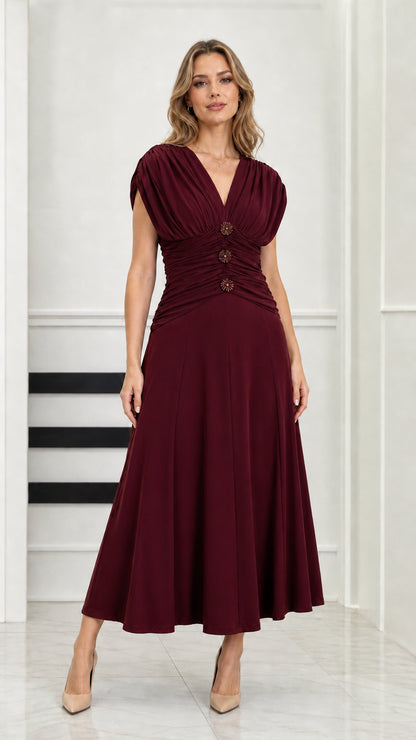 Front full-length view of model wearing burgundy ruched waist V-neck midi dress