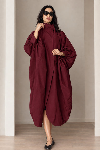Model wearing burgundy wine red oversized cocoon duster coat