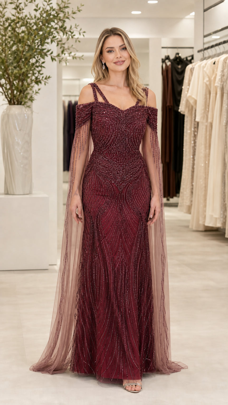 Front view of burgundy red beaded formal evening dress with capelet sleeves
