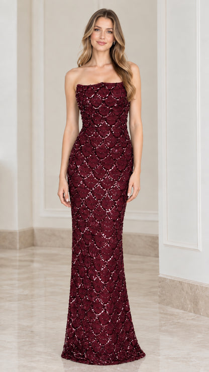 Full-length front view of strapless burgundy red sequin evening dress