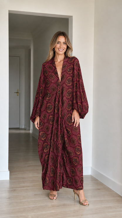 Model wearing Burgundy red paisley long sleeve maxi kaftan dress