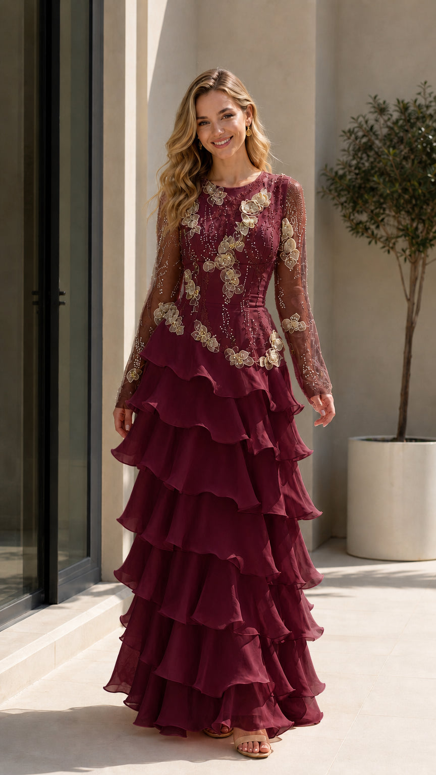 Model wearing Burgundy red floral embroidered tiered ruffle evening gown