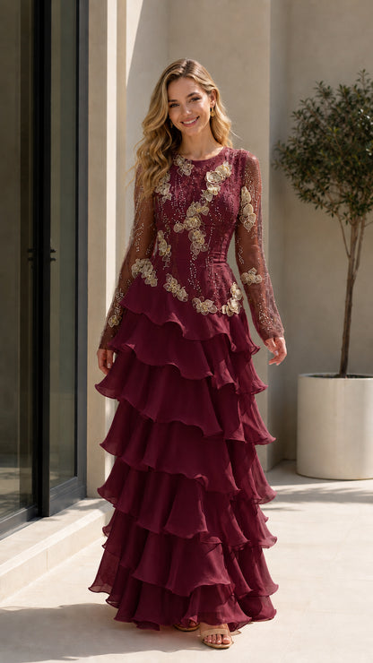 Model wearing Burgundy red floral embroidered tiered ruffle evening gown