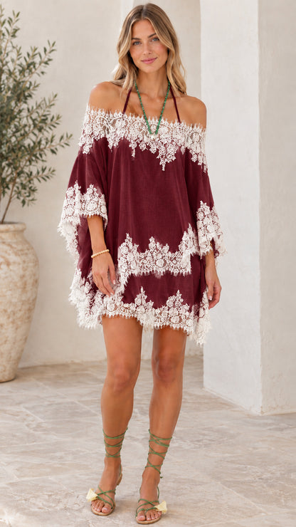 Model wearing Burgundy red off-the-shoulder lace tunic mini dress