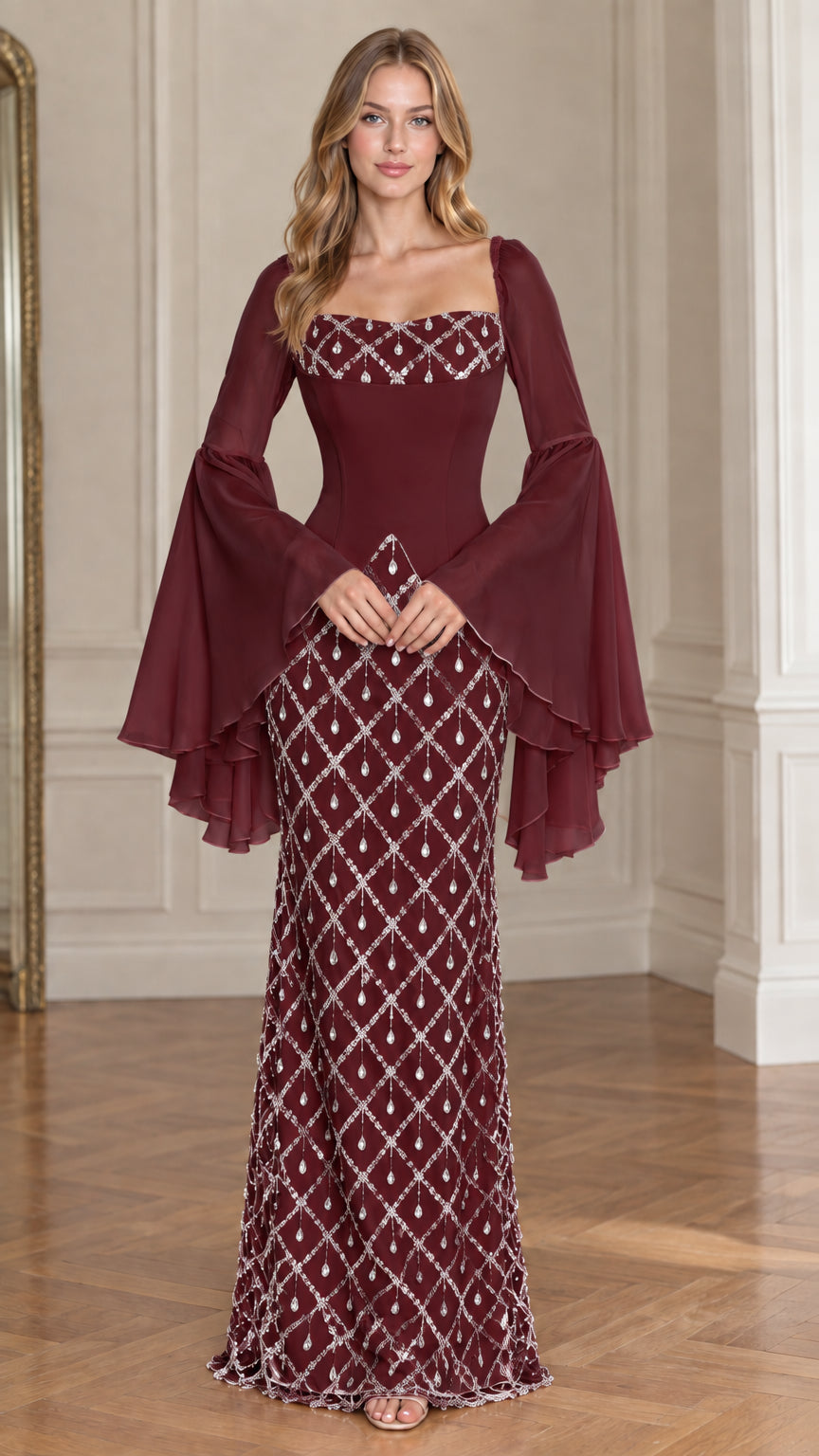 Front view of model wearing Burgundy wine embellished evening gown with dramatic bell sleeves