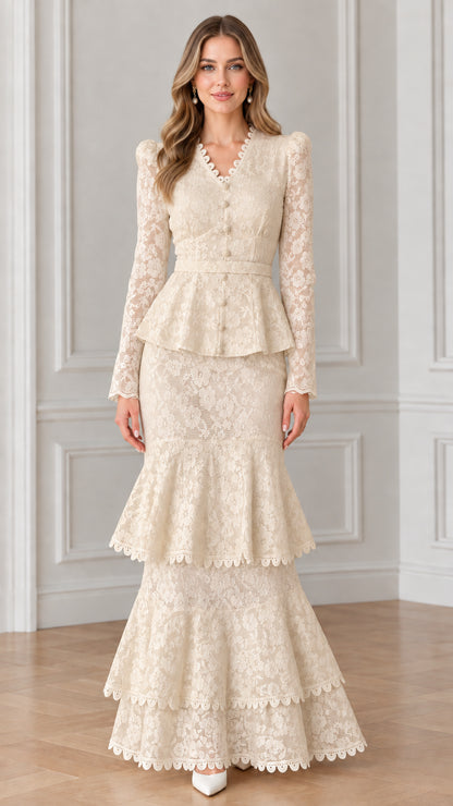 Front view of woman wearing champagne beige long sleeve lace mermaid dress