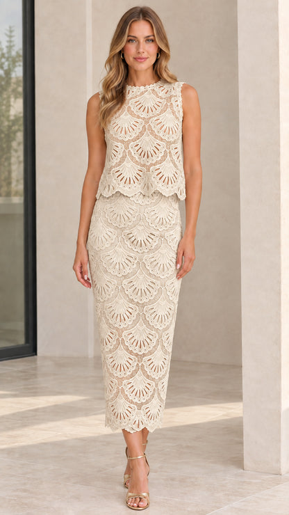 Model wearing beige champagne sleeveless scalloped eyelet lace layered midi dress