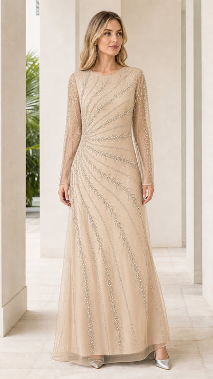 Woman wearing champagne beige embellished evening maxi dress