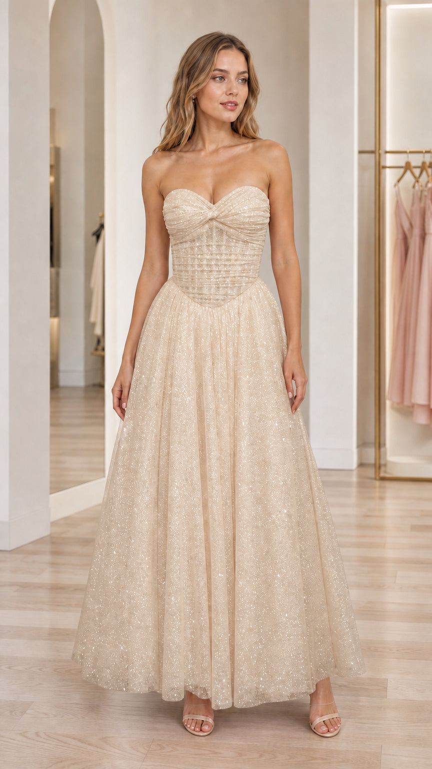 Front view of champagne strapless glitter tulle sweetheart ball gown