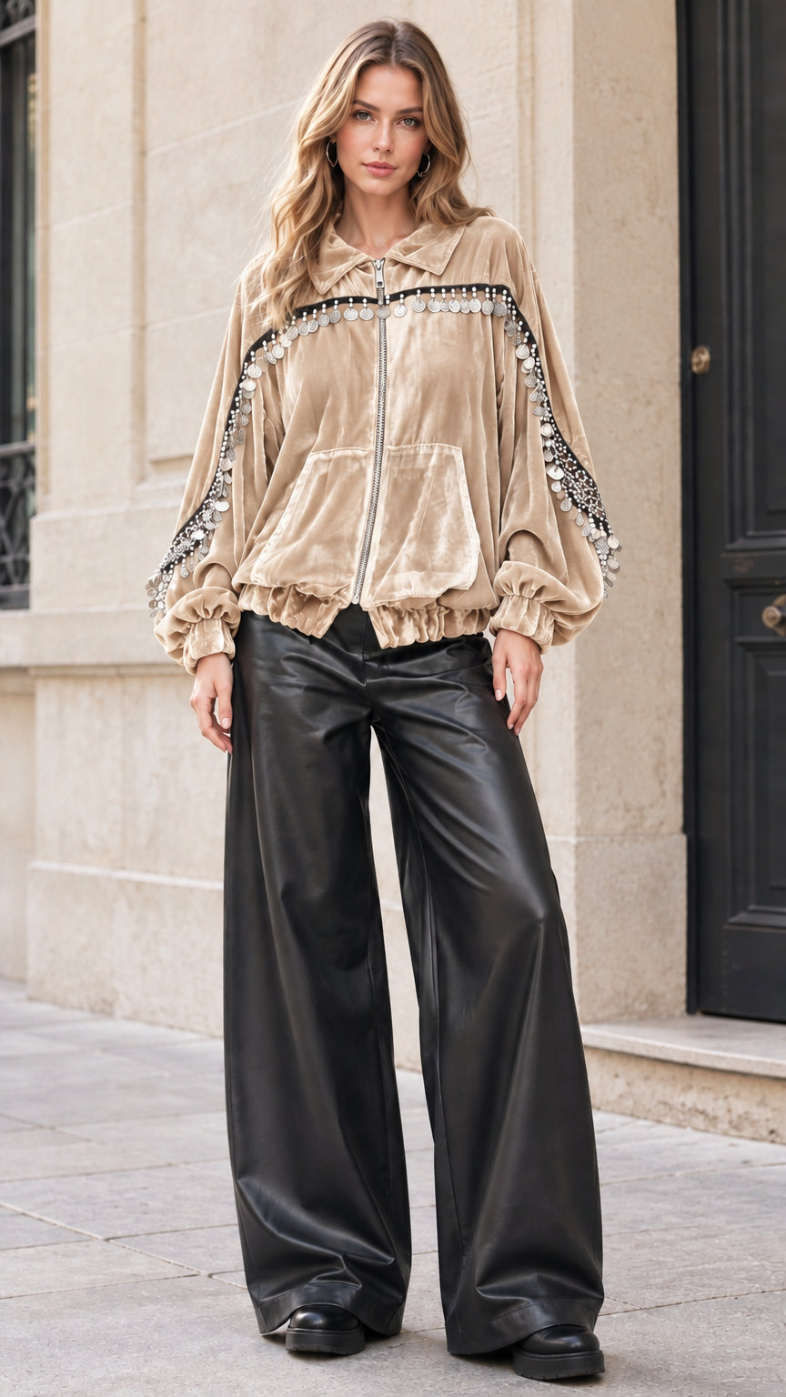 Model wearing beige champagne velvet zip-up jacket with coin accents