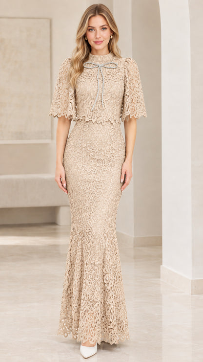 Front view of champagne beige lace capelet mermaid dress