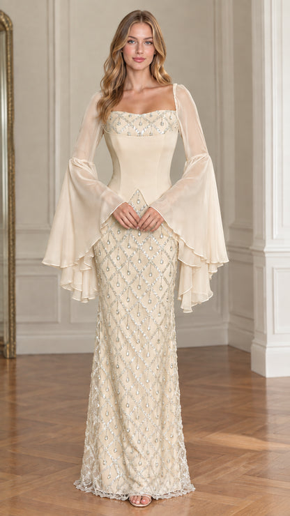 Front view of model wearing Champagne cream beaded square neck evening gown