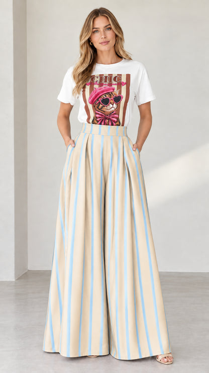 Full-length shot of white graphic tee and beige striped wide-leg pants set