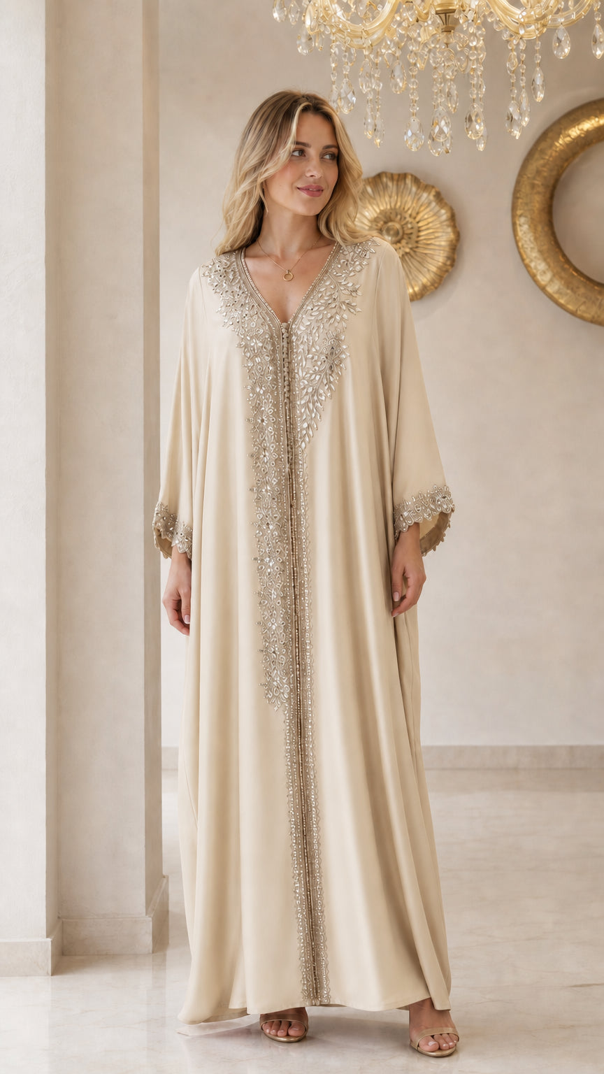 Front view of model wearing champagne cream embellished kaftan maxi dress