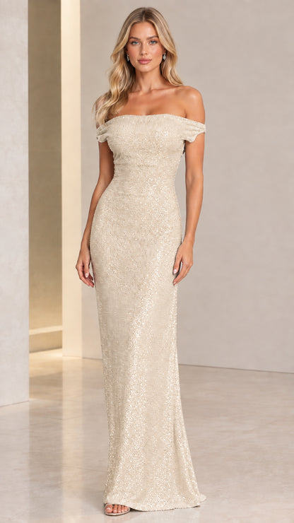 Model wearing an elegant champagne gold off-the-shoulder sequin maxi dress