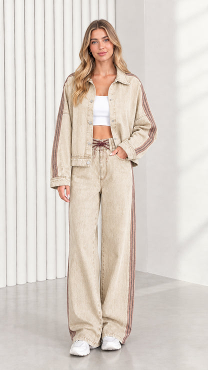 Model wearing Sand Beige casual two piece denim jacket and pants set