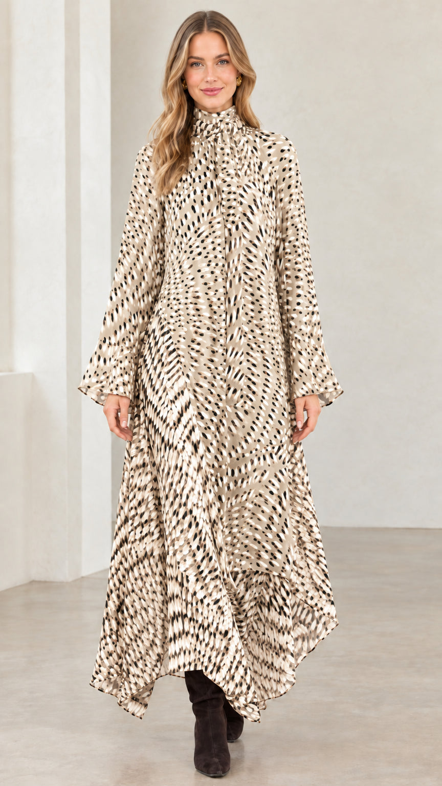 Model wearing beige and cream abstract print high neck handkerchief maxi dress