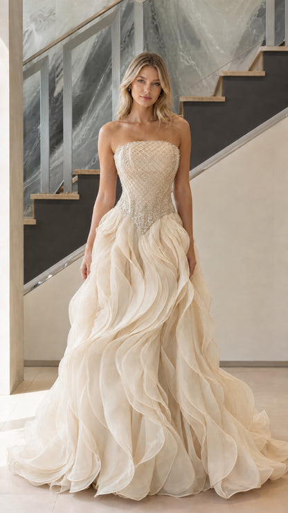 Front view of champagne ivory strapless beaded ruffle ball gown