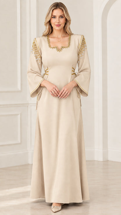 Front view of champagne beige beaded fringe shoulder maxi dress