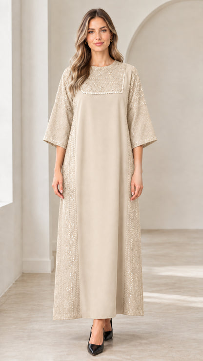 Front view of woman wearing beige champagne sequin embellished maxi dress