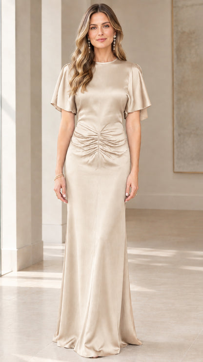 Model wearing neutral Champagne satin flutter sleeve maxi dress for weddings